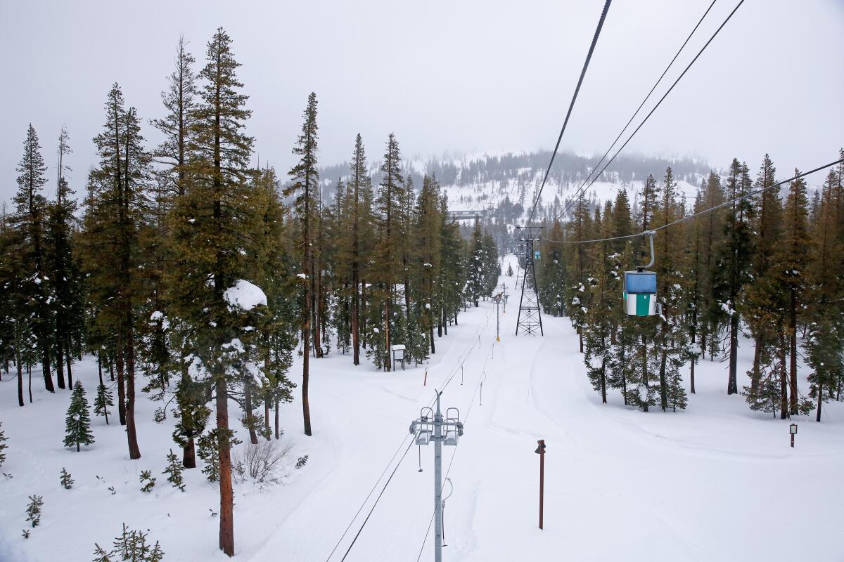A high-angle view of an empty ski lift at Sugar Bowl Ski Resort.