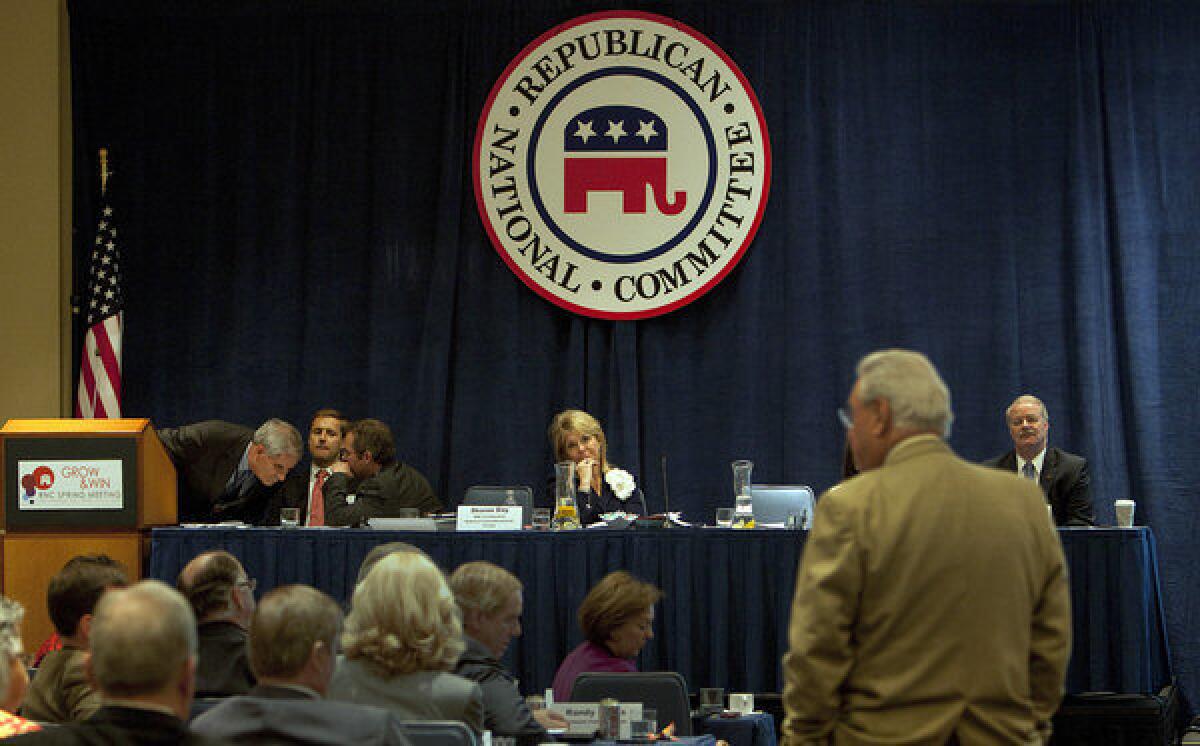 Ohio Committeeman Bob Bennett waits at the podium to speak during the Standing Committee on Rules meeting at the 2013 RNC spring gathering in Hollywood.