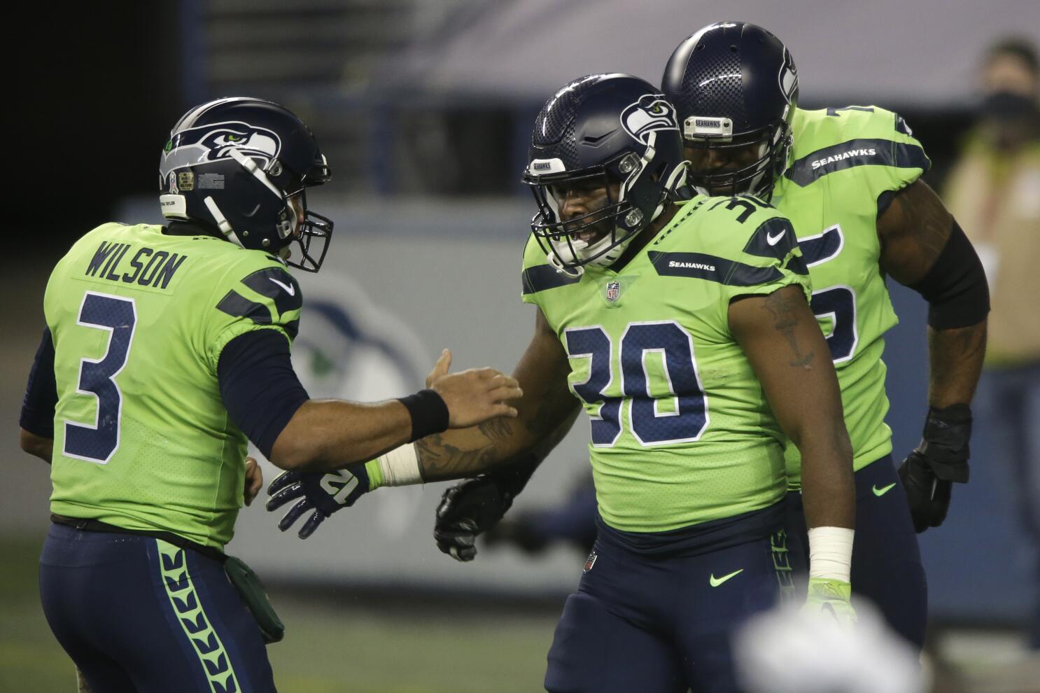 Wilson throws for 2 TDs, Seahawks hold off Cardinals 28-21