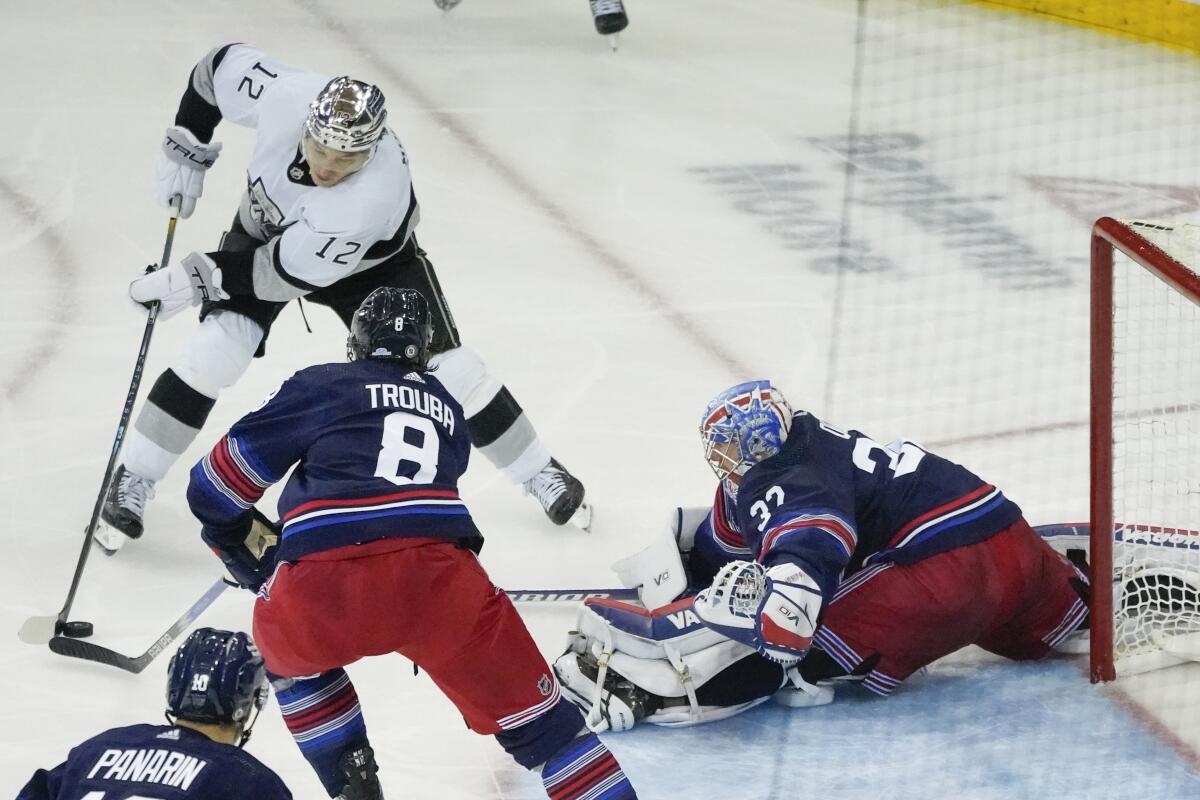 New York Rangers goaltender Jonathan Quick (32) stretches to save a shot by Los Angeles Kings.