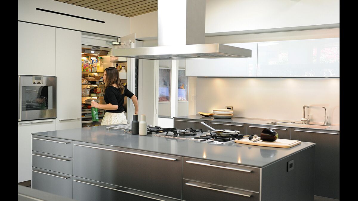 An ardent cook and baker, Spira installed a highly efficient and stylish kitchen by German design group Bulthaup as well as an outdoor barbecue area and pizza oven.