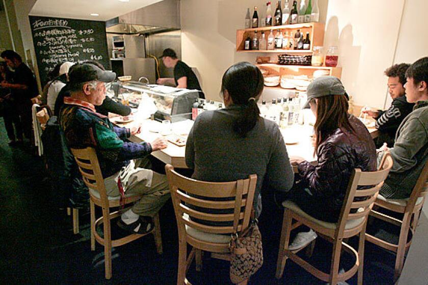 At kushiage restaurant Horon in Torrance, bar seating gives customers a view of the cook.