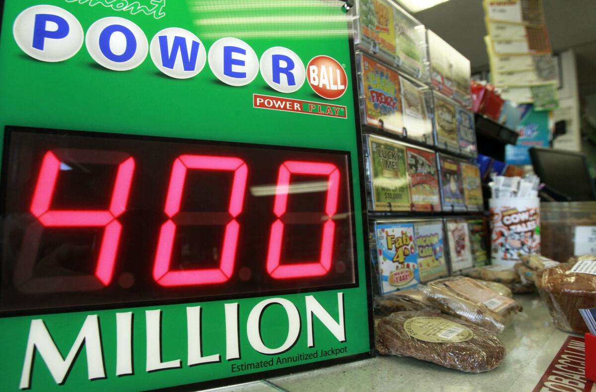 A sign shows the estimated jackpot for the Powerball drawing, Tuesday, Aug. 6, 2013, in Montpelier, Vt.