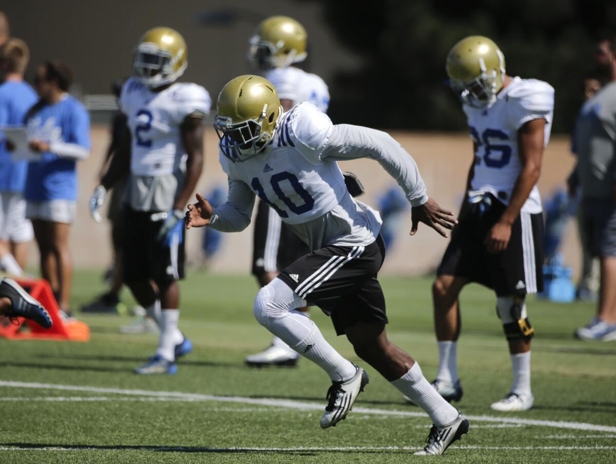 Fabian Moreau, center, is one of several experienced players returning to the UCLA secondary.