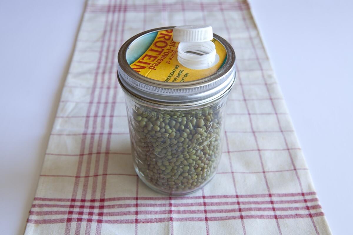 Turn your Mason jar into a pantry pour-spout container.