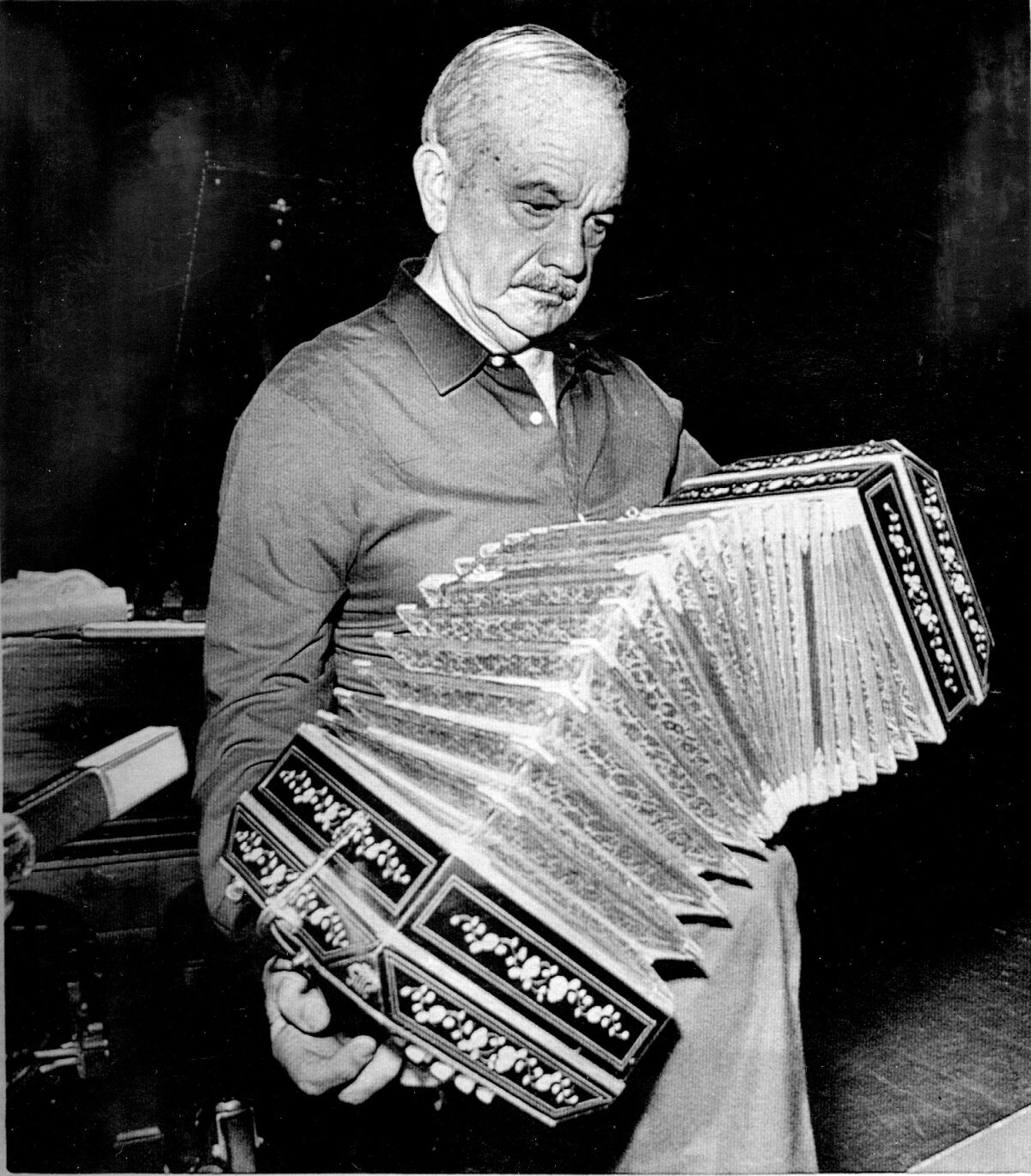 Astor Piazzolla plays the bandoneón.