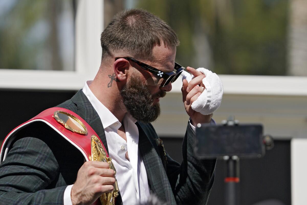 Caleb Plant is seen with a cut under his eye after a scuffle with Canelo ?lvarez