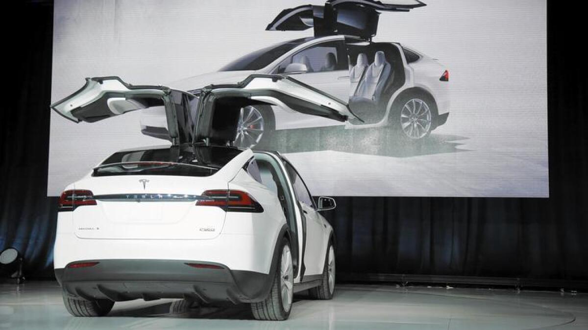 A small business owner with substantial federal tax exposure could place an order for Tesla's new seven-seater Model X and collect up to $35,000 in tax and government rebate benefits.