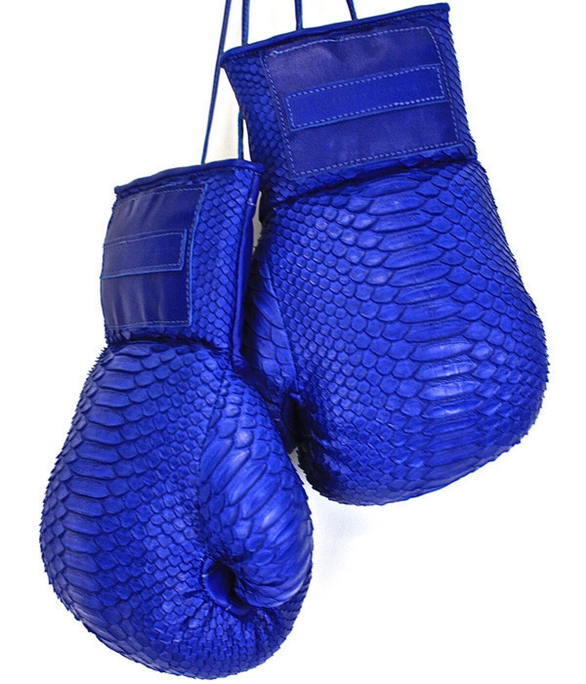 Elisabeth Weinstock painted anaconda boxing gloves.