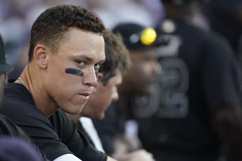 LOS ANGELES, CALIF. - AUGUST 25: New York Yankees right fielder Aaron Judge (99) sits on the bench during a Major League Baseball game against the Los Angeles Dodgers at Dodger Stadium on Sunday, Aug. 25, 2019 in Los Angeles, Calif. (Kent Nishimura / Los Angeles Times)