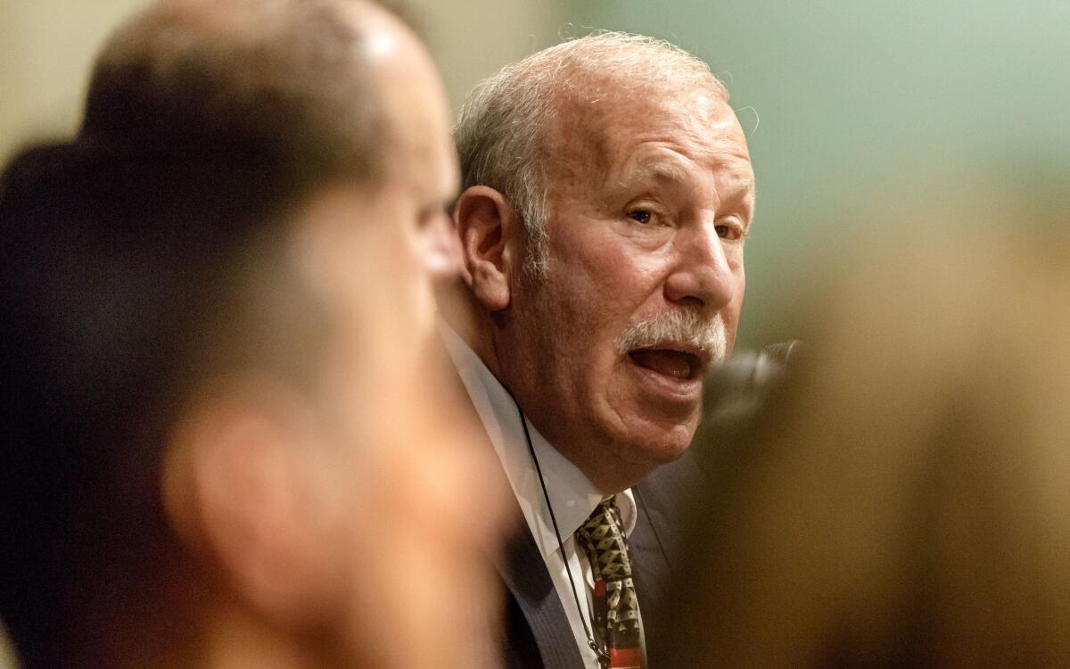 School board member Scott Schmerelson, right, is putting forward a resolution opposing a massive expansion of charter schools in Los Angeles.