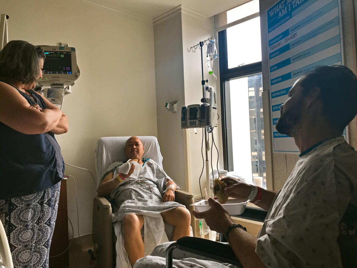 Binh Nguyen and Keith Michaelis enjoy a “taco toast" two days after Michaelis gave Nguyen a kidney.