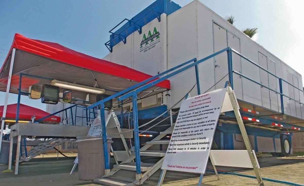 Tulare County officials installed free mobile showers at Iglesia Emmanuel church in East Porterville, where wells have run dry. Until now, hundreds of residents were forced to bathe from buckets and drink bottled water.