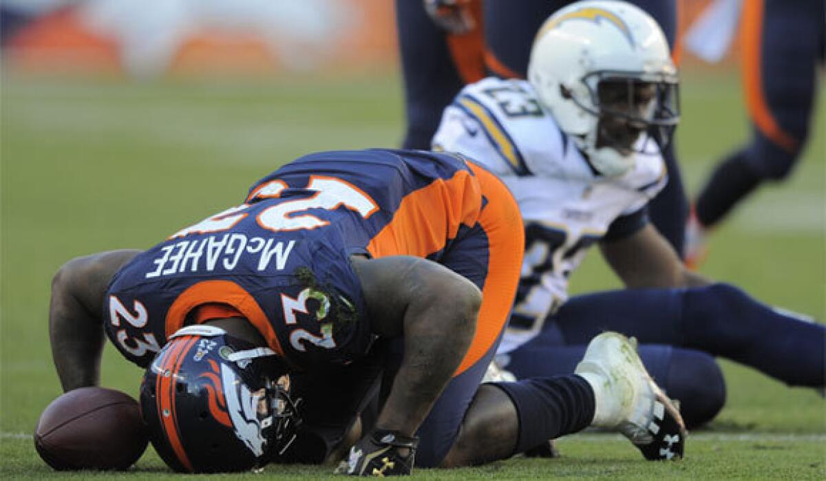 Denver running back Willis McGahee is slow to get up after a run against the San Diego Chargers on Sunday.