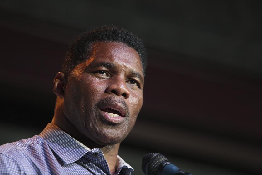FILE - Herschel Walker, GOP candidate for the US Senate for Georgia, speaks at a primary watch party May 23, 2022, at the Foundry restaurant in Athens, Ga. Senate candidate Herschel Walker said Saturday, June 18, that he “never denied" the existence of children he had not previously disclosed publicly, telling conservative Christians that “they knew the truth.” (AP Photo/Akili-Casundria Ramsess, File)