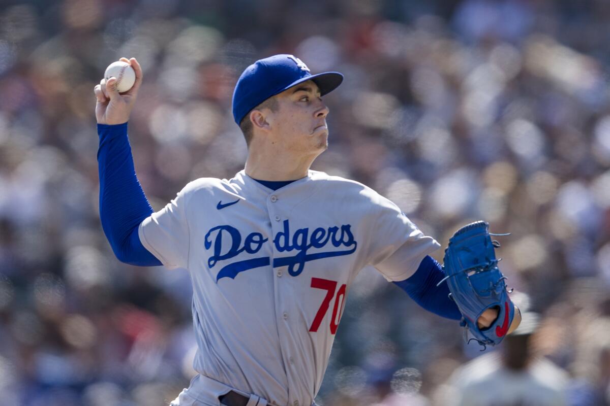 Dodgers' Bobby Miller pitches in the first inning against the San Francisco Giants on Oct. 1, 2023.