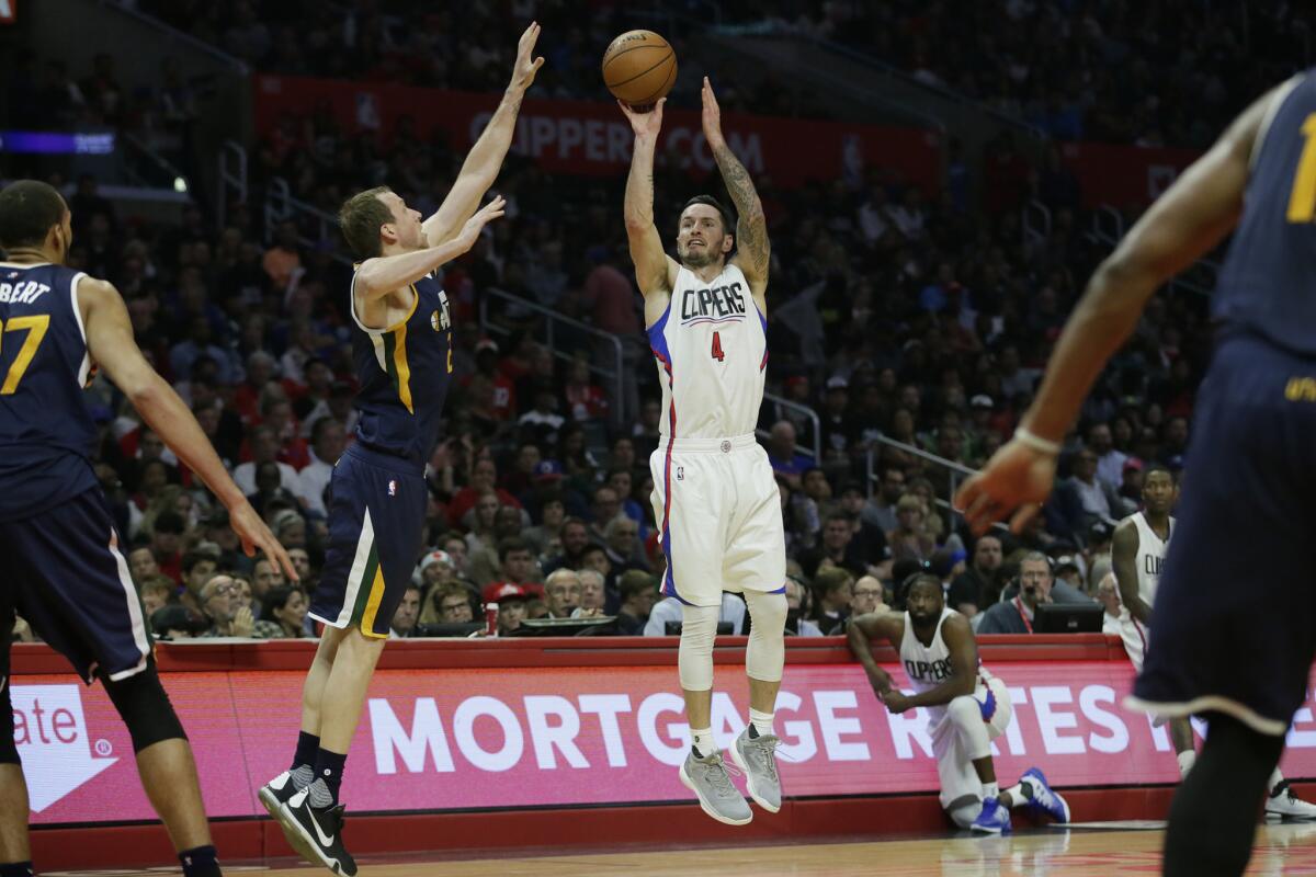Clippers guard J.J. Redick shoots over Jazz forward Joe Ingles during second half action on Oct. 30.