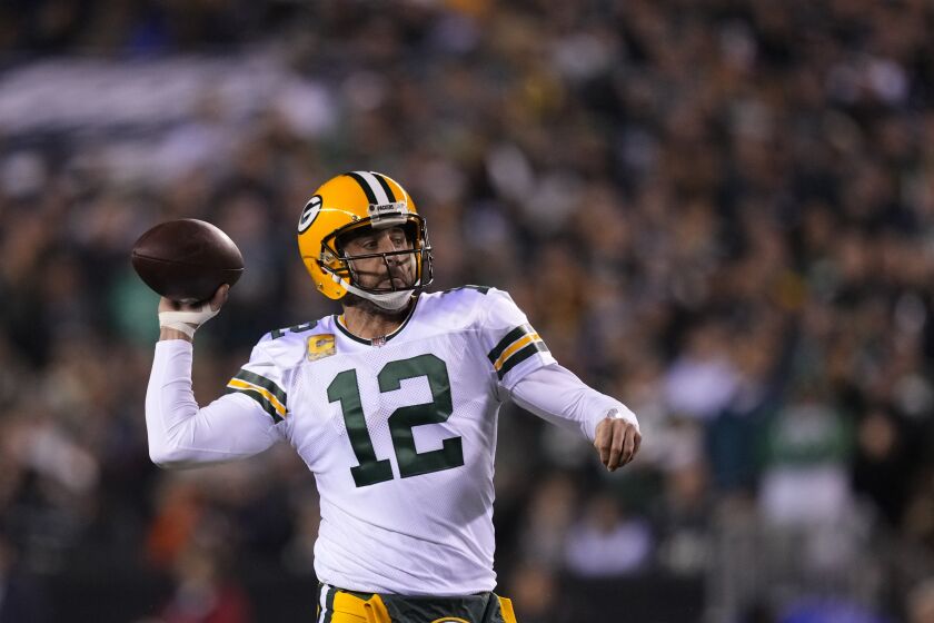 Green Bay Packers quarterback Aaron Rodgers throws during the first half of an NFL football game against the Philadelphia Eagles, Sunday, Nov. 27, 2022, in Philadelphia. (AP Photo/Matt Slocum)