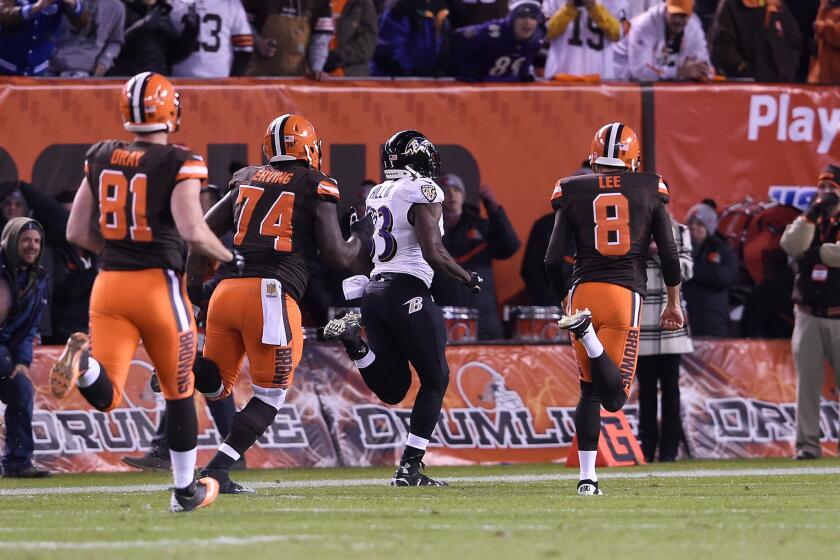Ravens defensive back Will Hill returns a blocked field goal for a touchdown as time expires to beat the Cleveland Browns.