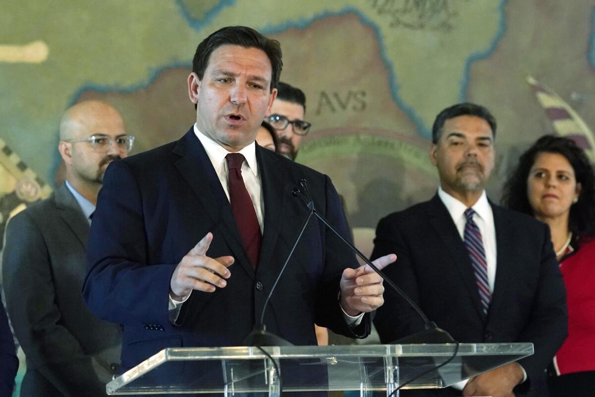 Florida Gov. Ron DeSantis speaks at Miami's Freedom Tower, Monday, May 9, 2022, in Miami. DeSantis approved two bills, one establishing November 7 as "Victims of Communism Day" and another bill to rename roads across the state for notable Cubans. The governor also announced that he will approve $25 million to renovate and restore the Freedom Tower. (AP Photo/Marta Lavandier)