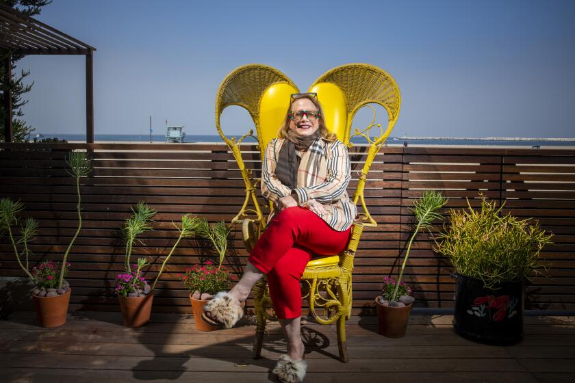 LOS ANGELES, CALIF. -- AUGUST 19, 2019--Composer Laura Karpman is photographed at her Los Angeles, Calif. home Monday, Aug. 19, 2019, in promotion of an upcoming performance of her score, ÒAll American,Ó by the L.A. Philharmonic, at the Hollywood Bowl. The score incorporates themes from past female composers, who were historically marginalized in the classical world. (Jay L. Clendenin / Los Angeles Times)