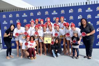 Orange Lutheran's unbeaten girls' water polo team won the Open Division championship.