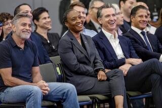 LOS ANGELES, CA-OCTOBER 13, 2023:Left to right-Actor George Clooney, U.S. Senator Laphonza Butler, California Governor Gavin Newsom, and L.A. Unified Superintendent Alberto Carvalho, react while listening to actor Don Cheadle address gathering during celebration of the 2nd year of the Roybal School of Film and Television Production Magnet in downtown Los Angeles. (Mel Melcon/Los Angeles Times)