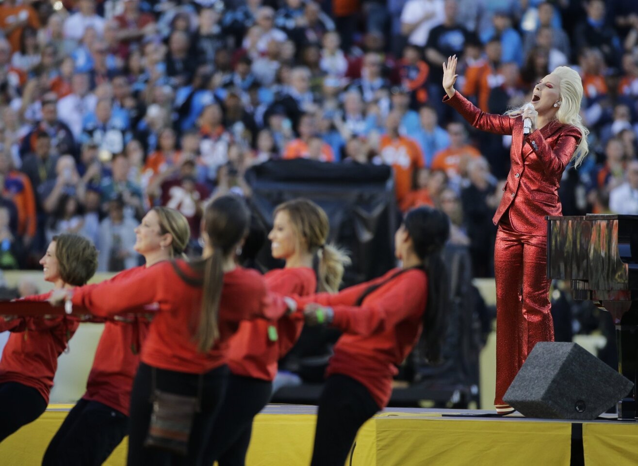 Lady Gaga sings the national anthem before the NFL Super Bowl 50 football game between the Denver Broncos and the Carolina Panthers, Sunday, Feb. 7, 2016, in Santa Clara, Calif. (AP Photo/Jae C. Hong)