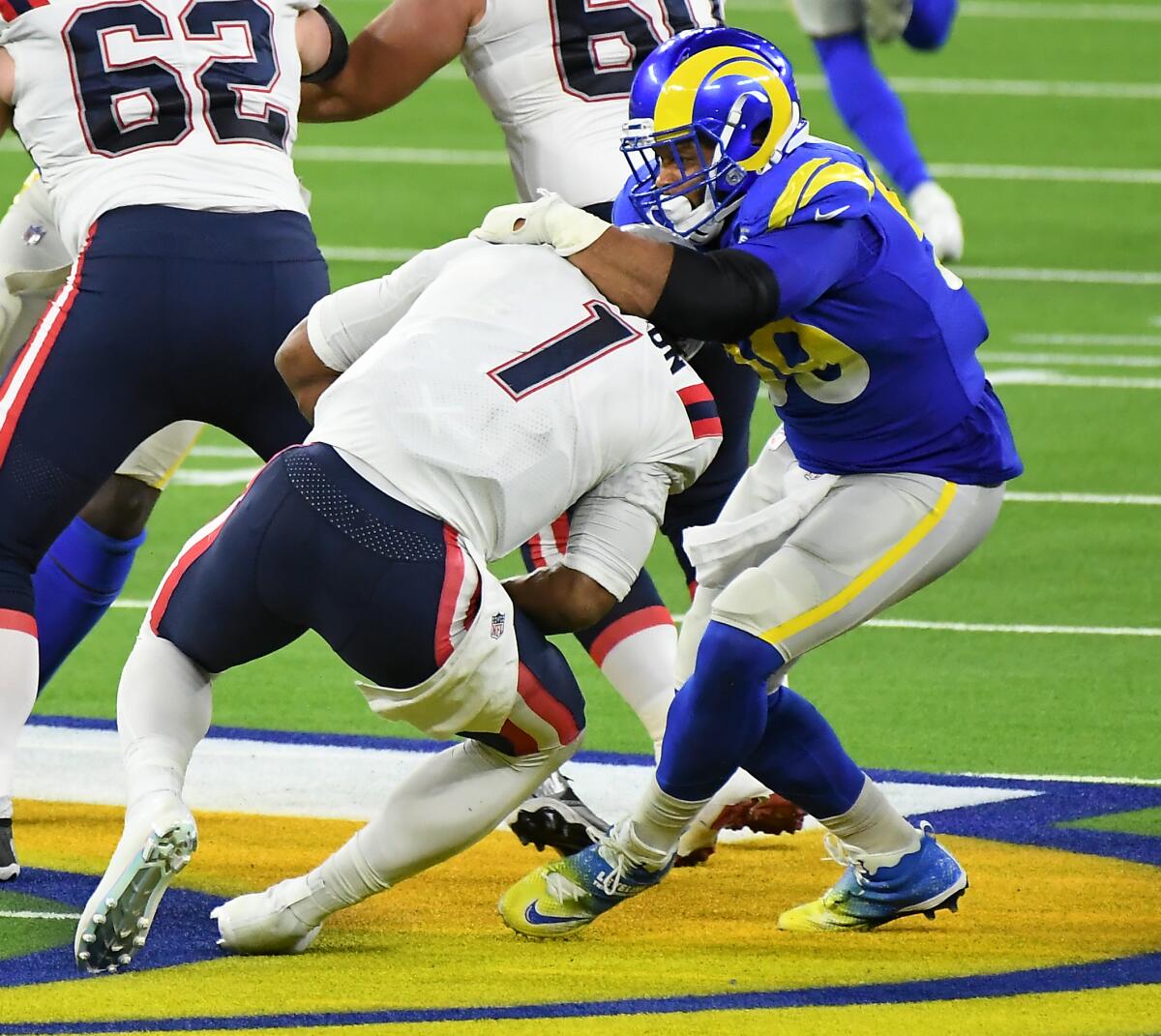 Rams defensive lineman Aaron Donald sacks Patriots quarterback Cam Newton in the second half.