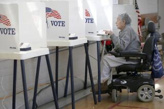 Woman casting ballot at the Hollywood Recreation Center