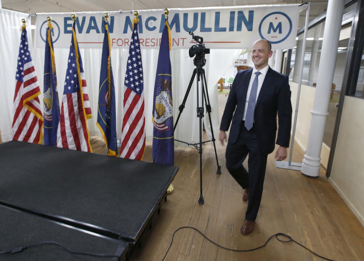 Evan McMullin approaches the stage to announce his presidential campaign in Salt Lake City on Aug. 10.