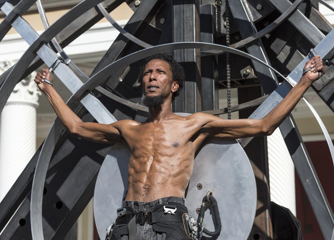 A giant rotating steel wheel dominated the Getty Villa's "Prometheus Bound," but Ron Cephas Jones conveyed the anguish and defiance.