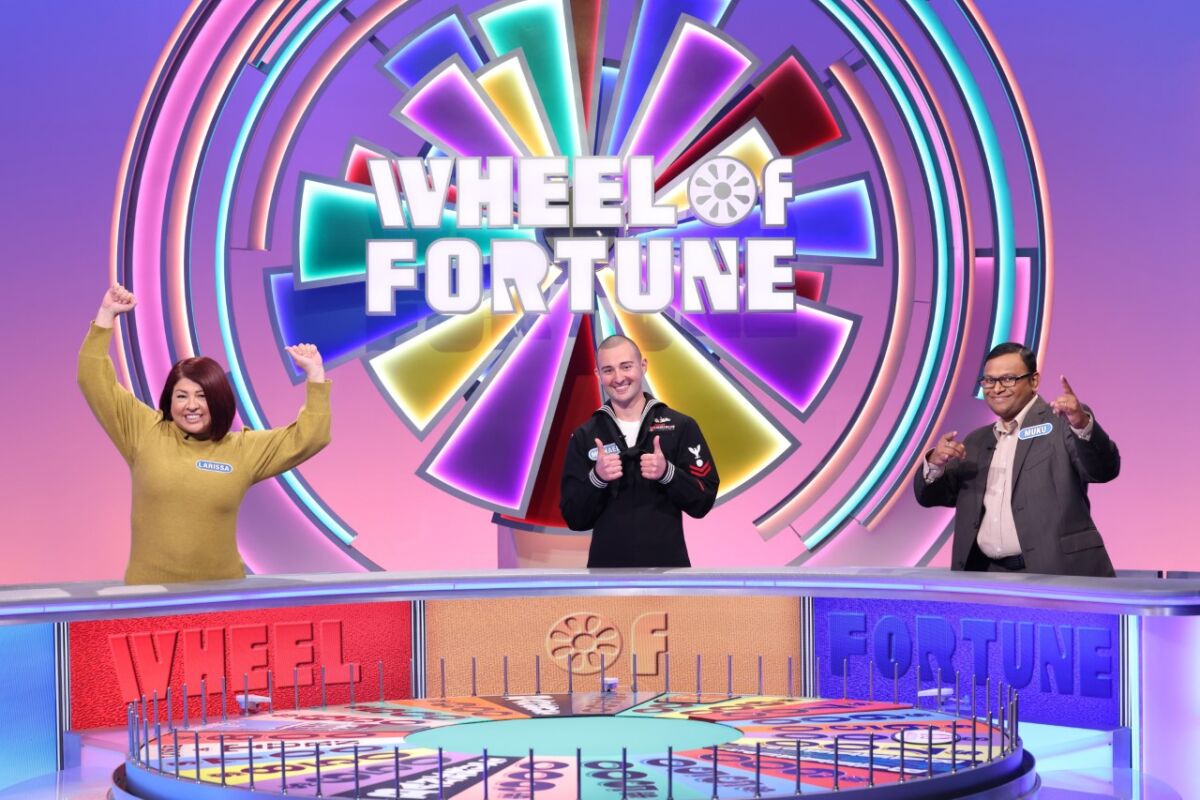 San Diegans Larissa Frost, Michael Iliopoulos and Muku Krishna (l to r) compete on "Wheel of Fortune" episode airing Feb. 1.