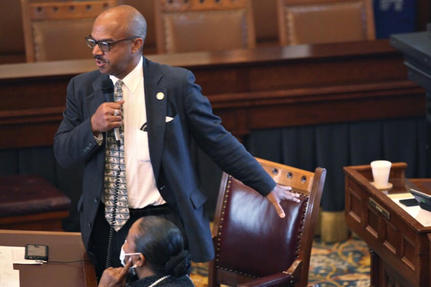 Kansas state Sen. David Haley, D-Kansas City, speaks to his colleagues upon being forced to vote instead of abstaining on overriding Democratic Gov. Laura Kelly's veto of a proposal to ban transgender athletes from girls' and women's school sports, Monday, May 3, 2021, at the Statehouse in Topeka, Kan. Haley has voted against overriding the veto, dooming the effort to impose the ban. (AP Photo/John Hanna)