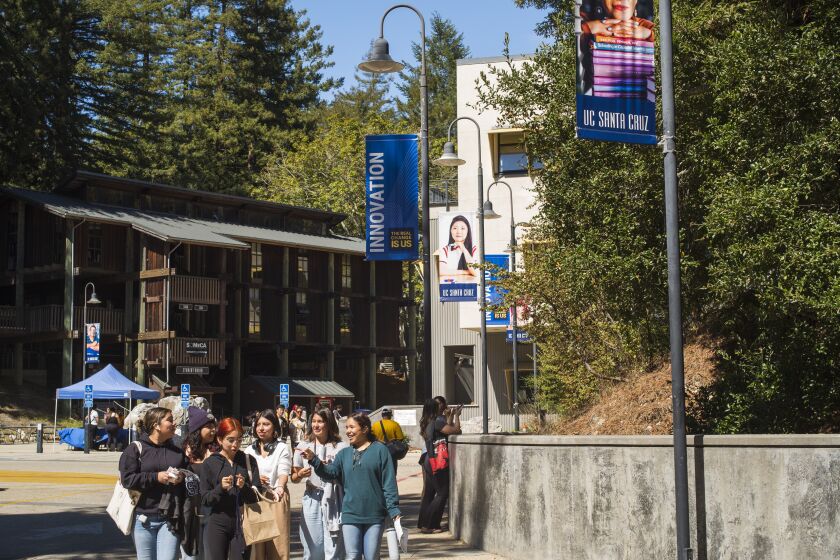 SANTA CRUZ, CA - SEPTEMBER 21, 2022: Students walk through the campus of University of California Santa Cruz in Santa Cruz, Calif., Wednesday, Sept. 21, 2022. (Nic Coury / For The Times)