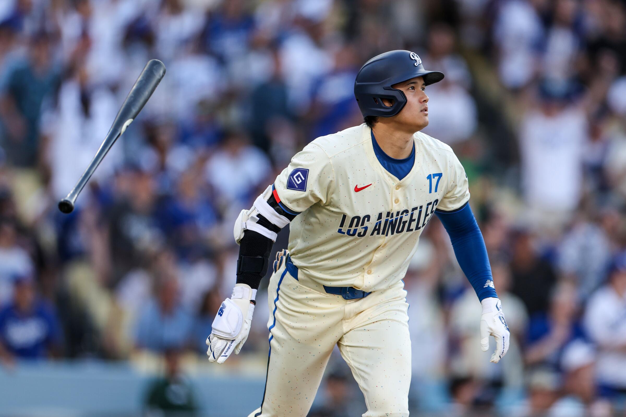Dodgers star Shohei Ohtani hits a solo home run in the eighth inning of a 5-3 win over the Milwaukee Brewers.