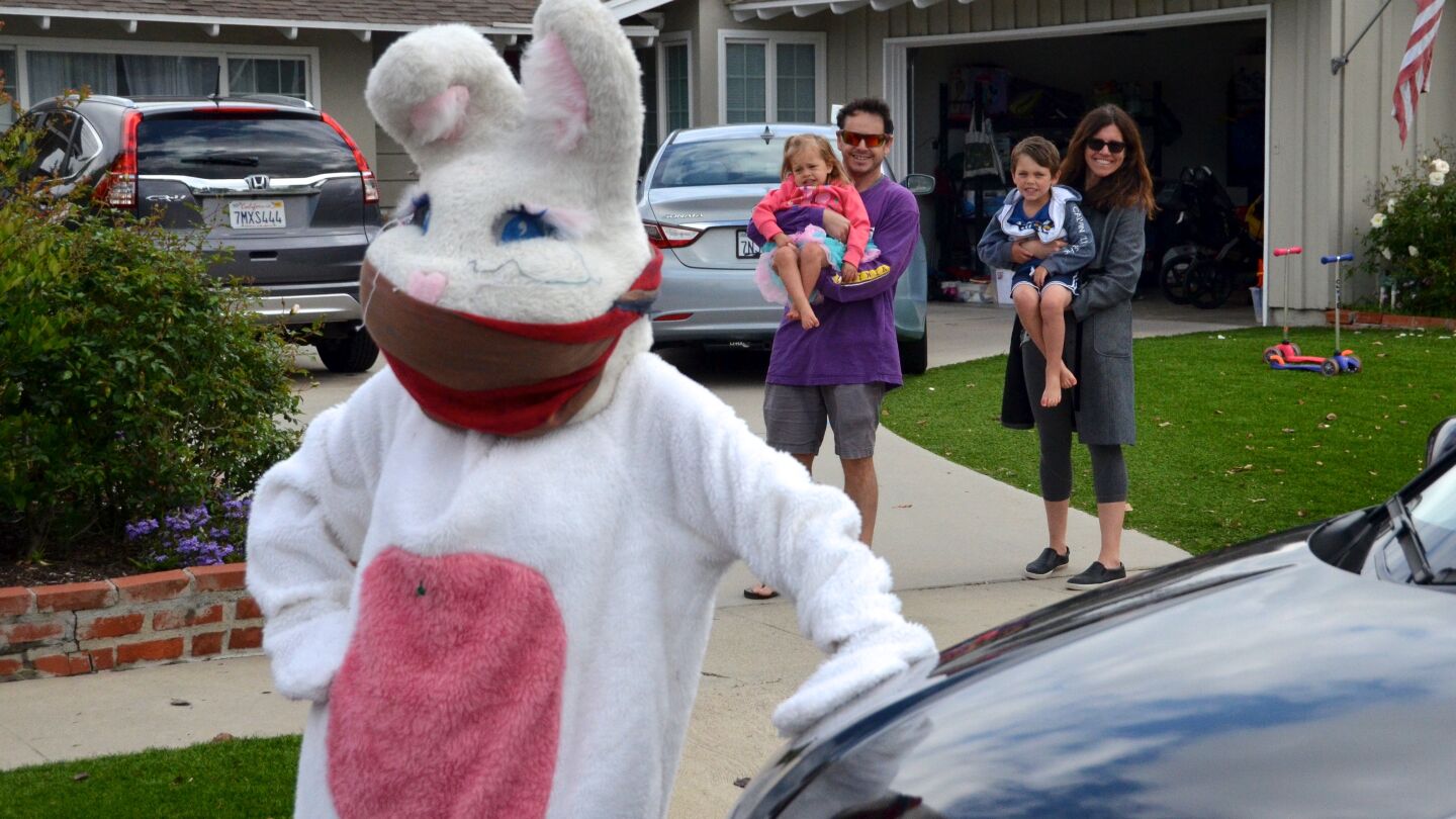 The Gilles family was happy to have a visit from the Easter Bunny on Saturday in front of their Mesa Verde home.