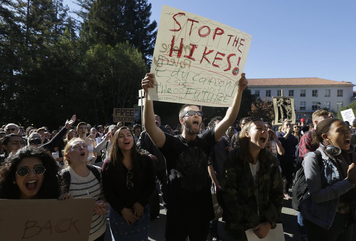 University of California Berkeley student Cameron Morgan, center, protests last month with other students against tuition increases.