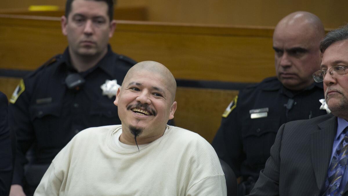 Luis Bracamontes smiles as the verdict is read that he will receive the death penalty in the murders of Sacramento Sheriff's Deputy Danny Oliver and Placer County Det. Michael Davis Jr., Tuesday, March 27, 2018.