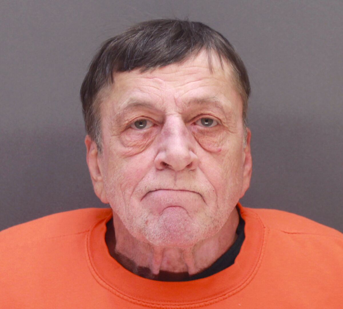 FILE - This booking photo released by the Wright County, Minn., Sheriff's Office shows Gregory Paul Ulrich. Ulrich, 68, will stand trial beginning May 16, 2022, on charges of murder, attempted murder and other counts in the Feb. 9 shooting at the Allina Health Clinic in Buffalo, a small city about 40 miles (65 kilometers) northwest of Minneapolis. (Wright County Sheriff's Office via AP, File)