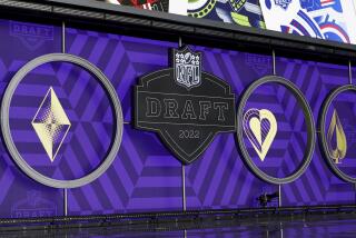 A general view of the NFL Draft 2022 logo in the NFL Draft Theater, Wednesday, April 27, 2022, in Las Vegas. The 2022 NFL Draft will be held April 28-April 30. (AP Photo/Steve Luciano)