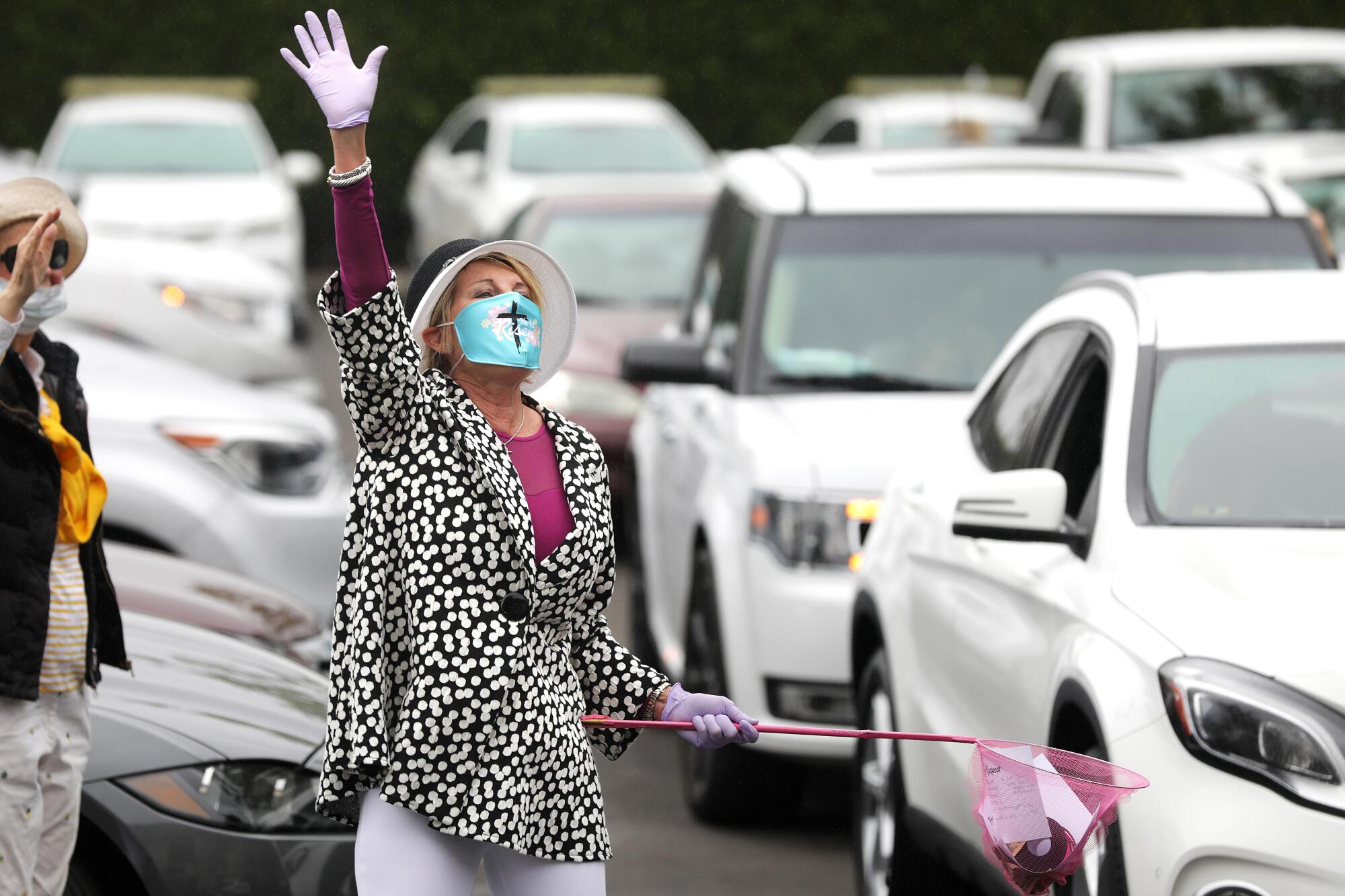 MaryAnn Lawson collects prayer requests in a Santa Ana parking lot.