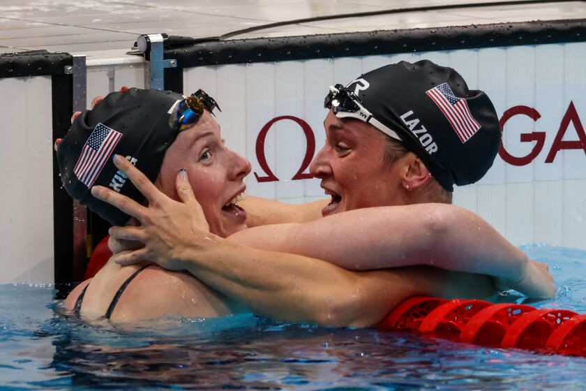 Tokyo, Japan, Friday, July 30, 2021 -USA swimmers Lilly King, left.