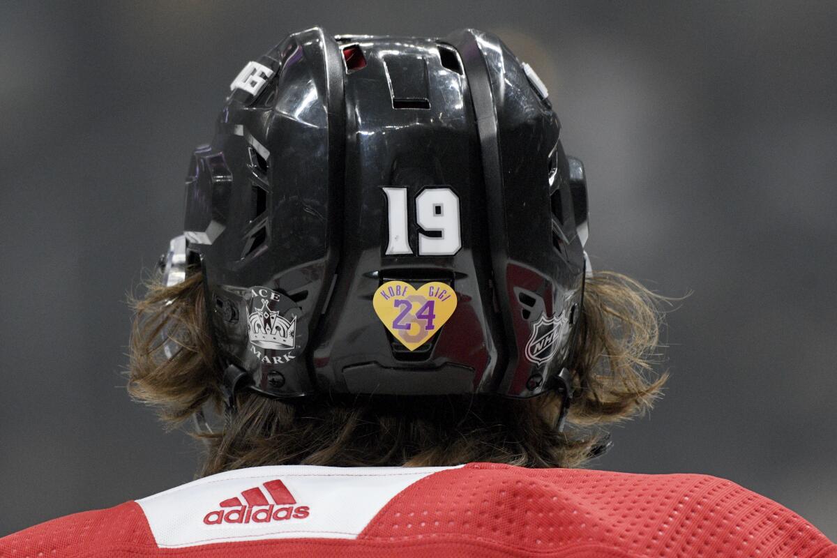 Kings left wing Alex Iafallo wears a sticker on his helmet honoring Kobe Bryant and his daughter Gigi before a game against the Tampa Bay Lightning on Wednesday at Staples Center. All the Kings players wore the stickers on their helmets. 