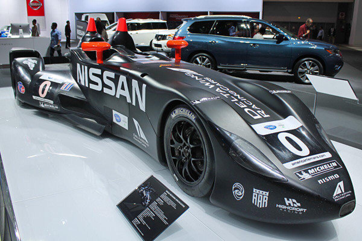 The Nissan DeltaWing weighs only 1,047 pounds and makes 300 horsepower from a 1.6-liter turbocharged four-cylinder engine. It's on display at the 2012 L.A. Auto Show.