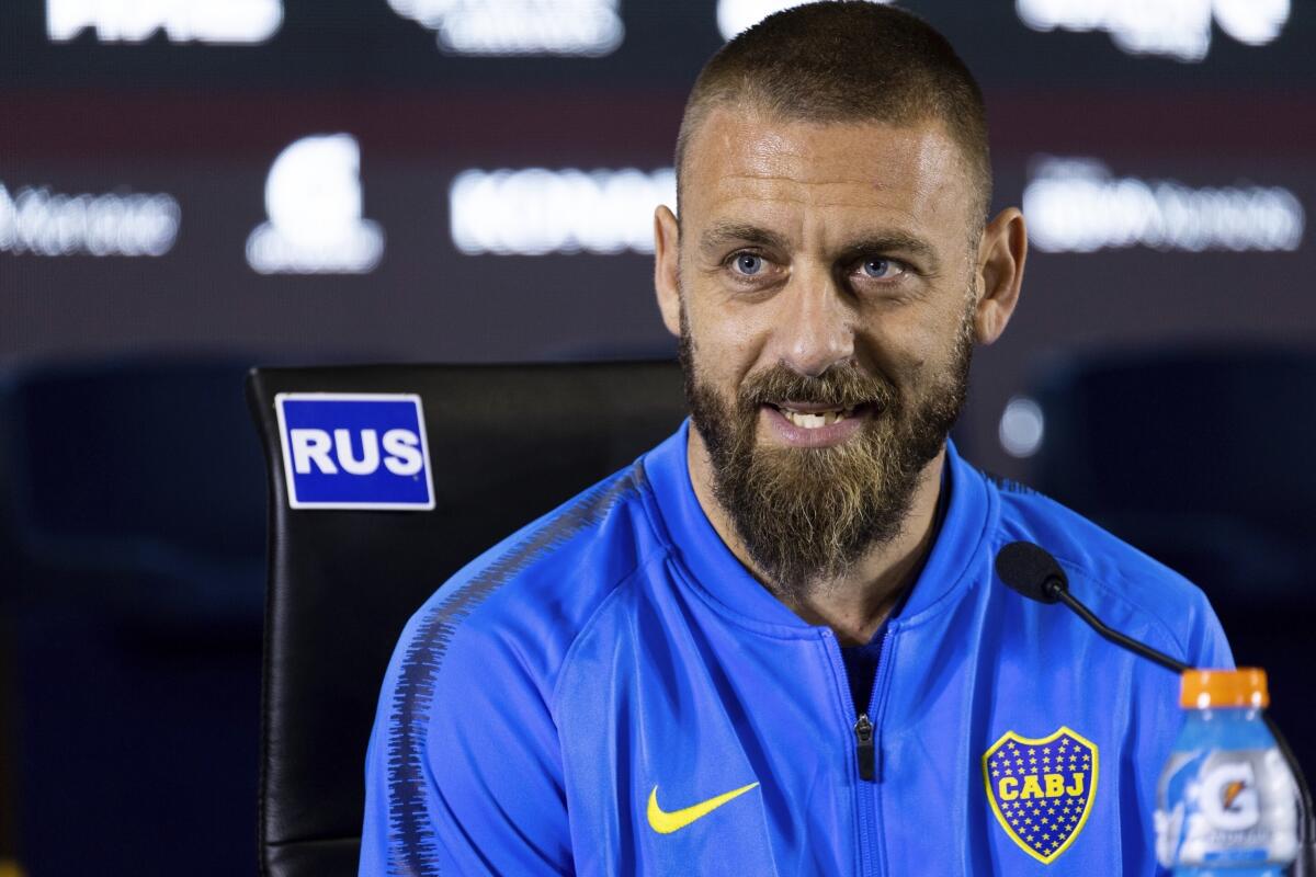 FILE - In this Monday, July 29, 2019 file photo, Daniele De Rossi speaks during a press conference in Buenos Aires, Argentina. The Italian soccer federation said Friday, April 9, 2021 that Italy assistant coach De Rossi had been admitted to an infectious diseases hospital with pneumonia after testing positive for the coronavirus. He was one of four Azzurri staff members to contract COVID-19 during recent World Cup qualifiers. (AP Photo/Tomas F. Cuesta, File)