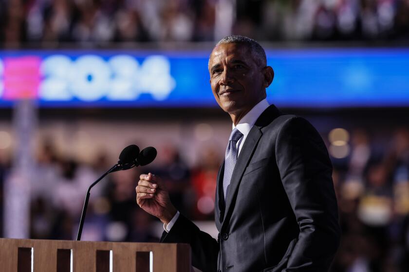 Chicago, Ill, Tuesday, August 20, 2024 - Former President Barack Obama delivers a speech at the Democratic National Convention at the United Center. (Robert Gauthier/Los Angeles Times)