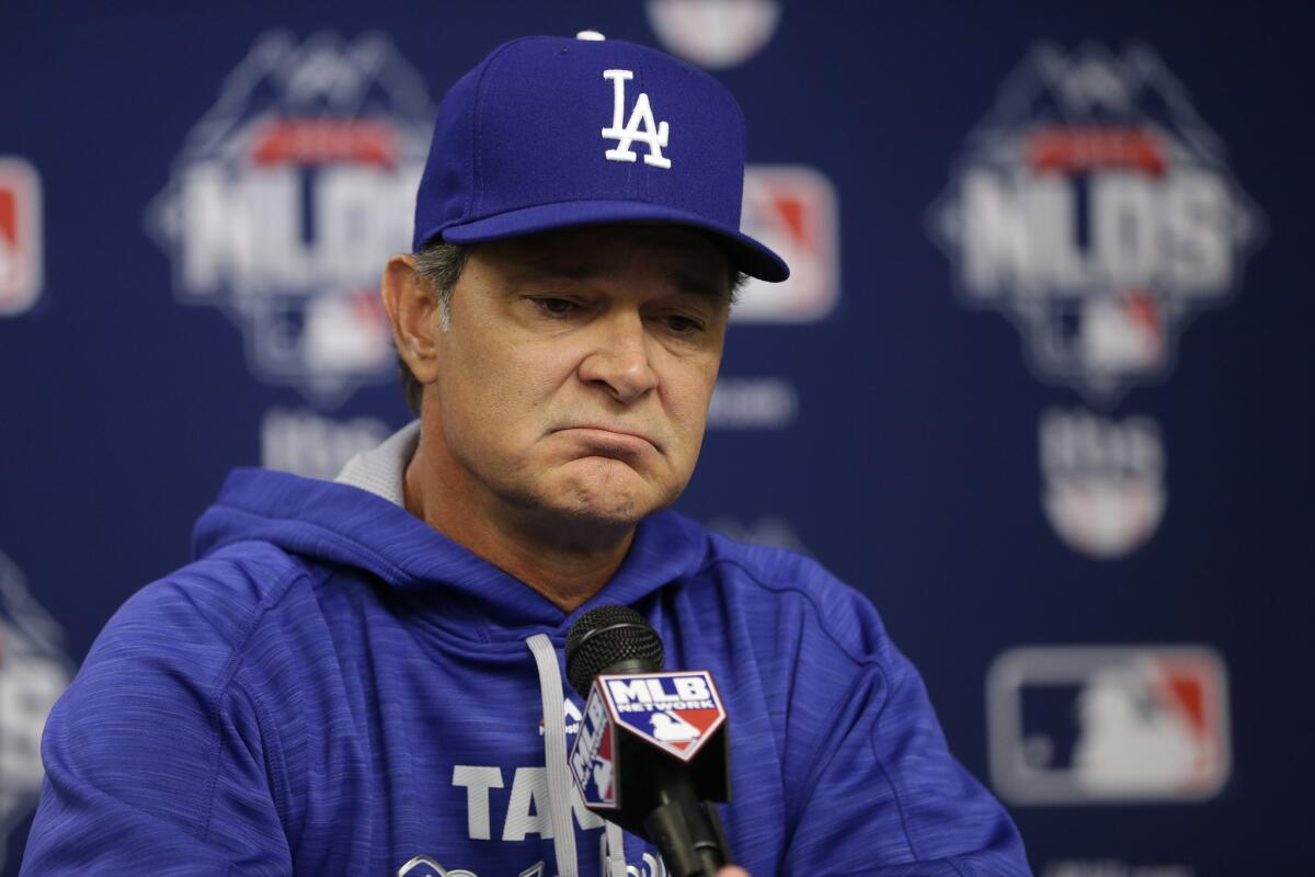 Dodgers Manager Don Mattingly speaks during a news conference before Game 3 of the National League division series against the Mets in New York on Oct. 12.