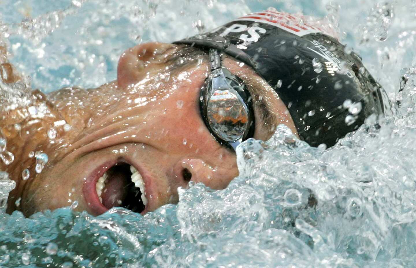 Michael Phelps competes in the 200-meter freestyle in the 2004 Athens Olympics.