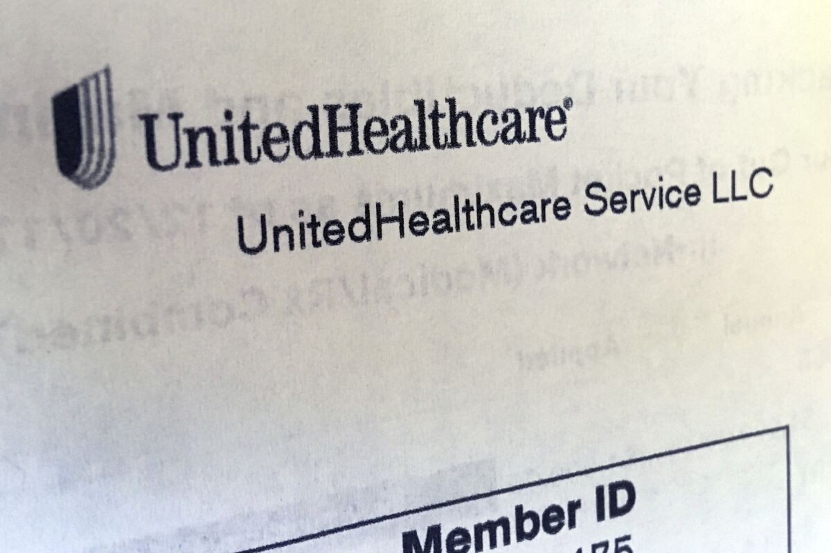 FILE - In this June 15, 2018 file photo, United Healthcare correspondence is seen in North Andover, Mass. UnitedHealth Group’s on-and-off relationship with the Affordable Care Act’s health insurance marketplaces is heating up again. The nation’s largest health insurance provider is looking to jump back into a market it largely fled a few years ago after suffering huge losses. Company leaders said Wednesday, April 15, 2020, that they started thinking about a potential expansion before the coronavirus pandemic hit, and they are still reviewing markets. (AP Photo/Elise Amendola, File)